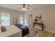 Bedroom with a ceiling fan and a door to the deck at 3329 Walt Stephens Rd, Stockbridge, GA 30281