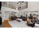Spacious living room with hardwood floors, staircase, comfortable seating, and an open concept design at 4120 Abingdon, Cumming, GA 30041