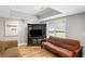 A cozy living room featuring a built-in entertainment center and comfortable seating at 4120 Abingdon, Cumming, GA 30041