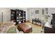Cozy home office featuring a comfortable seating area and ample shelving at 4120 Abingdon, Cumming, GA 30041