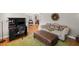 Comfortable home office with a desk, couch, ottoman and hardwood floors at 4120 Abingdon, Cumming, GA 30041
