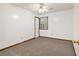 Bedroom features neutral carpet and a window at 4214 Fiddlers Bnd, Loganville, GA 30052