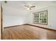 Bedroom with wood floors and windows at 4214 Fiddlers Bnd, Loganville, GA 30052