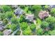 Spacious home featuring a well-manicured lawn, mature trees, and neighborhood streets at 4770 Spring Park Cir, Suwanee, GA 30024