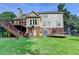Expansive backyard with playset, trampoline, and shed provides a fun outdoor space at 4770 Spring Park Cir, Suwanee, GA 30024