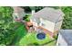 Beautiful backyard with a deck, playset, trampoline, and well-maintained lawn at 4770 Spring Park Cir, Suwanee, GA 30024