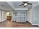 Finished basement area featuring hardwood floors and access to bar through a set of french doors at 4770 Spring Park Cir, Suwanee, GA 30024