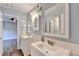 Bright bathroom featuring a double sink vanity with modern fixtures and decor at 4770 Spring Park Cir, Suwanee, GA 30024