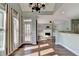 Inviting dining area showing doorway to living room with fireplace and built-ins at 4770 Spring Park Cir, Suwanee, GA 30024