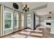 Inviting dining area with hardwood floors, natural light and chandelier lighting at 4770 Spring Park Cir, Suwanee, GA 30024