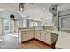 Open concept kitchen with countertop seating and dining nook at 4770 Spring Park Cir, Suwanee, GA 30024
