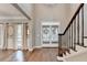 Open-concept living area boasts hardwood floors and lots of light at 4770 Spring Park Cir, Suwanee, GA 30024