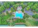 A beautiful community pool with ample seating and a well-maintained surrounding landscape at 4770 Spring Park Cir, Suwanee, GA 30024