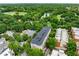 A charming building surrounded by lush green landscape with a small body of water nearby at 1055 Piedmont Ne Ave # 106, Atlanta, GA 30309