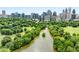 Beautiful green landscape with a lake. City skyline in the distance at 1055 Piedmont Ne Ave # 106, Atlanta, GA 30309