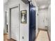 Hallway featuring hardwood floors and two entry ways at 1055 Piedmont Ne Ave # 106, Atlanta, GA 30309