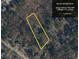 Aerial view of a 1.3 acre plat overview in Lilburn, Georgia, surrounded by mature trees at 4853 Carlene Sw Way, Lilburn, GA 30047