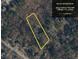 Aerial view of a 1.3 acre lot at 4853 Carlene Way SW, Lilburn, GA, in a wooded area surrounded by houses at 4853 Carlene Sw Way, Lilburn, GA 30047