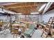 Functional basement area featuring workbenches, tool storage, and ample space for DIY projects at 4853 Carlene Sw Way, Lilburn, GA 30047