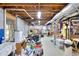 Unfinished basement area with exposed ductwork and a window, providing ample storage and natural light at 4853 Carlene Sw Way, Lilburn, GA 30047