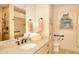 Well-lit bathroom with granite countertops, and a walk-in glass shower at 4853 Carlene Sw Way, Lilburn, GA 30047