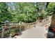 Spacious deck perfect for outdoor dining and entertaining, with views of the landscaped yard at 4853 Carlene Sw Way, Lilburn, GA 30047