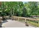 Spacious deck perfect for outdoor dining and entertaining, with views of the landscaped yard at 4853 Carlene Sw Way, Lilburn, GA 30047