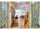 Welcoming entryway with hardwood floors, a decorative front door, and a staircase at 4853 Carlene Sw Way, Lilburn, GA 30047