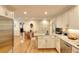 Bright kitchen with white cabinets, stainless steel appliances and an eat-in island at 4853 Carlene Sw Way, Lilburn, GA 30047