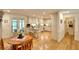Bright kitchen with white cabinetry, stainless steel appliances, and a breakfast nook at 4853 Carlene Sw Way, Lilburn, GA 30047