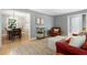 Open-concept living room with views of dining room, and comfortable furnishings at 215 Ansley Ct, Roswell, GA 30076