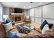 Comfortable living room with fireplace and decorative accents, perfect for relaxation at 215 Ansley Ct, Roswell, GA 30076
