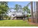 Rear view of the home showing the deck, shed, and large yard at 3220 Casteel Rd, Marietta, GA 30062