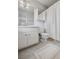 Bright bathroom featuring white fixtures, cabinets, and coordinated decor at 3220 Casteel Rd, Marietta, GA 30062