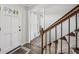 Foyer view featuring the front door, staircase, and hardwood floors at 3220 Casteel Rd, Marietta, GA 30062
