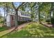 Traditional-style home with well-maintained landscaping and a brick facade at 3220 Casteel Rd, Marietta, GA 30062