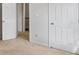 Brightly lit hallway with fresh paint and clean carpet at 3220 Casteel Rd, Marietta, GA 30062