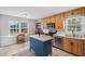 Bright kitchen with a kitchen island, stainless steel appliances and natural light at 3220 Casteel Rd, Marietta, GA 30062