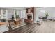 Large living room with hardwood floors, fireplace, and open concept design at 3220 Casteel Rd, Marietta, GA 30062