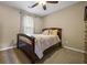Bedroom with carpet flooring, natural light, and ceiling fan at 496 Bottesford Nw Dr, Kennesaw, GA 30144