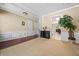 Open living room with views to kitchen, hardwood floors, carpet and neutral walls at 496 Bottesford Nw Dr, Kennesaw, GA 30144