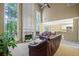 Bright living room with fireplace and views into the kitchen, plus comfortable seating at 496 Bottesford Nw Dr, Kennesaw, GA 30144