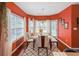 Dining room with bright walls, natural light, and a modern table setting for elegant meals at 2011 Wildcat Lake Ct, Lawrenceville, GA 30043