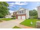 Charming two-story home with a brick facade, two-car garage, and well-maintained landscaping at 2011 Wildcat Lake Ct, Lawrenceville, GA 30043