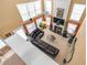 An aerial view of a living room with a fireplace and a large leather sofa at 2011 Wildcat Lake Ct, Lawrenceville, GA 30043