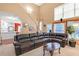 A spacious living room features a high ceiling, staircase, and comfortable seating area at 2011 Wildcat Lake Ct, Lawrenceville, GA 30043