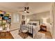 Comfortable bedroom features a ceiling fan, beautiful window shutters, and soft, inviting decor at 3163 Neal Ct, Cumming, GA 30041