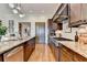 Kitchen with granite countertops, stainless steel appliances, and hardwood floors at 3163 Neal Ct, Cumming, GA 30041