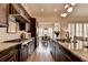 Kitchen with stainless steel appliances, granite countertops, kitchen island with barstool seating at 3163 Neal Ct, Cumming, GA 30041