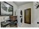 Well-appointed laundry room with stacked washer/dryer and decorative baskets for a functional and stylish space at 3163 Neal Ct, Cumming, GA 30041
